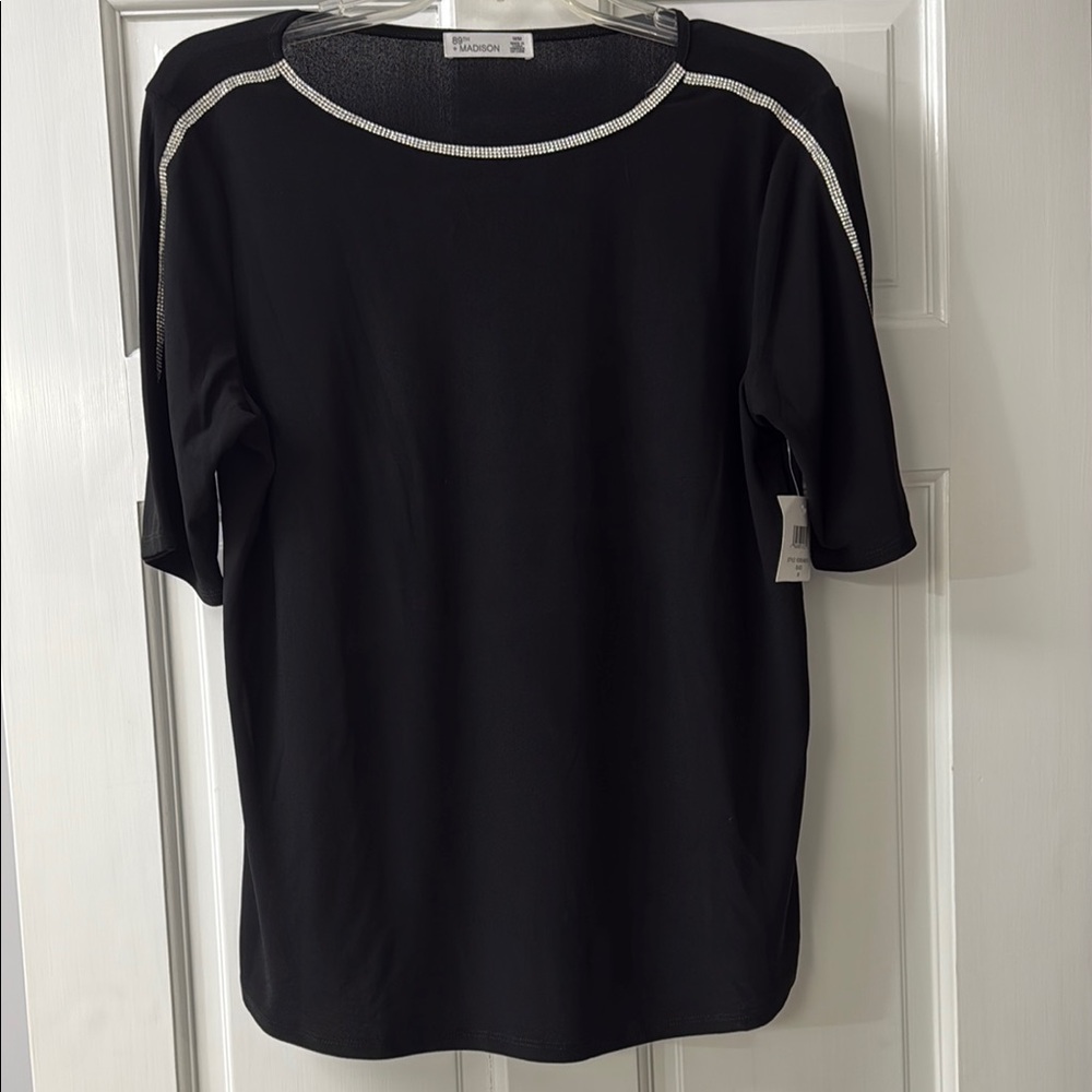 Elegant Black Top with Silver Accents